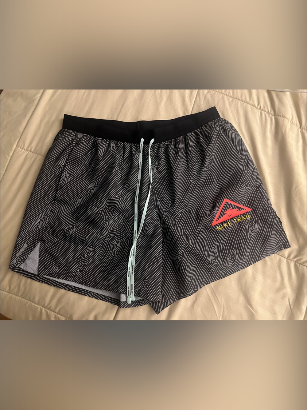 Nike Black Patterned Running Shorts with Mint Drawstring and Red Logo